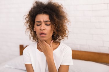African-american woman with coughing