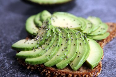 Sandwich with avocado - healthy breakfast concept