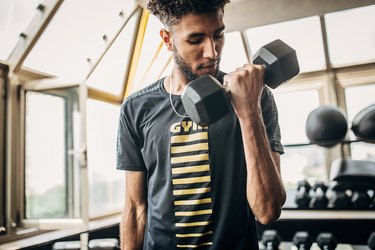 Man performing proper biceps curl