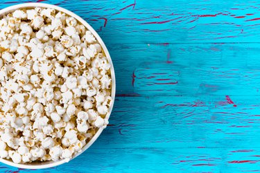 Bowl of freshly made popcorn on a picnic table