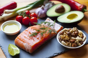 Mediterranean diet foods, including salmon, nuts and avocado