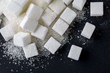 Background of sugar cubes. Top view