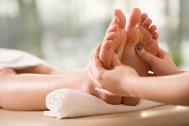 Close-up of a foot massage, as a natural remedy for plantar fasciitis