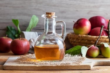 a bottle of apple cider vinegar, as a natural remedy for athlete's foot