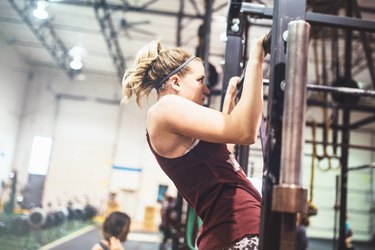 Cross Training Woman Doing Pull Ups