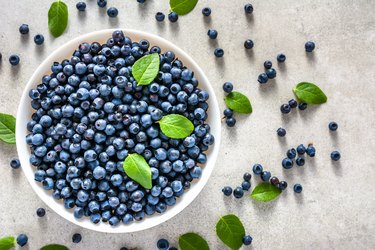 Fresh blueberry on plate, organic food and healthy super foods concept