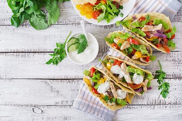 Mexican tacos with chicken, bell peppers, black beans