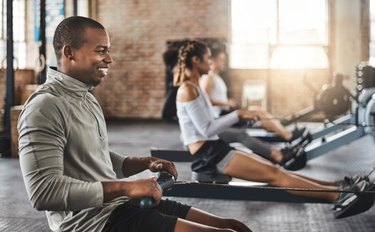 People in a rowing fitness class