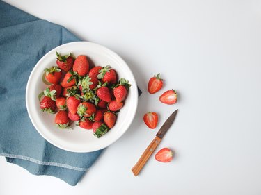High Angle View Of Strawberries At Table