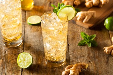 Refreshing golden ginger ale in glass