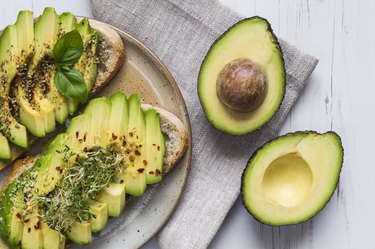 Top view of avocado toast, as an example of foods to gain weight for females