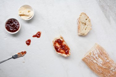 Flat lay of homemade french bread baguette sliced