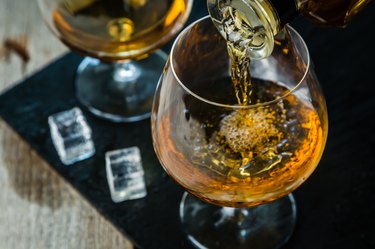 Pouring cognac in a glass