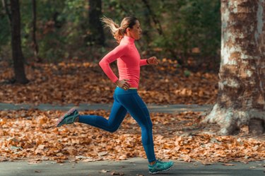 Woman Jogging Outdoors in Park