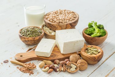 Select sources of vegan protein on a wooden background