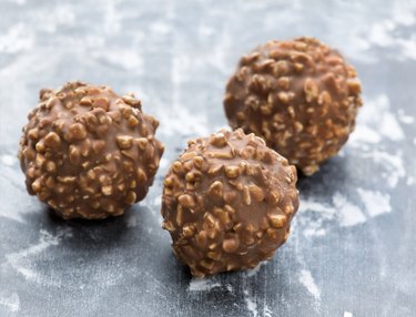 view of 3 Ferrero Rocher chocolate candies