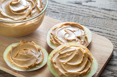 Slices of apples with peanut butter