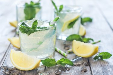 Chilled mint lemonade and carbonated water background