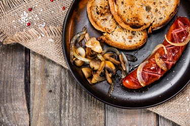 Sausage with toasted bread and mushrooms