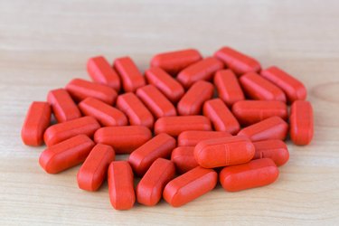Red film coated tablets of Multi Vitamins and Minerals, anti stress formula