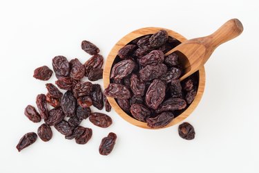 Jumbo raisins in wooden bowl