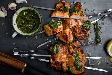 Barbequed chicken breast skewers with chimichurri sauce