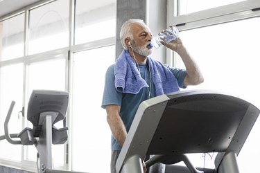 Senior man on a treadmill enjoin run