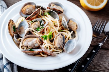 A bowl of traditional Italian seafood pasta with clams