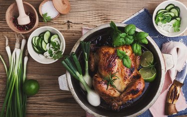 Roasted chicken with green vegetables salad and fresh herbs