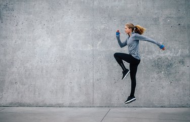 Fit young woman doing cardio interval training