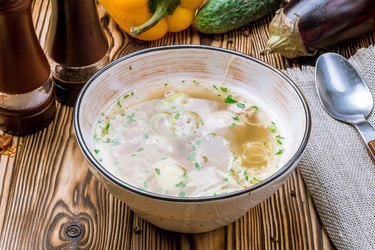 Chicken soup bouillon in a plate