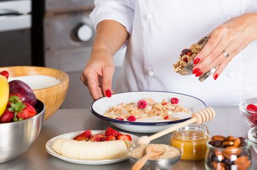 Midsection Of Chef Preparing Food In Commercial Kitchen for fiber and cholesterol