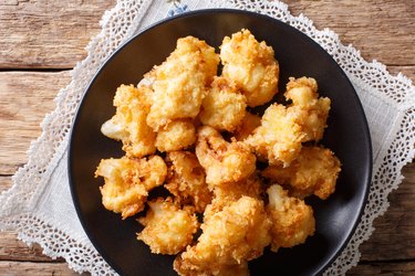 fried cauliflower in breading close-up. Horizontal top view