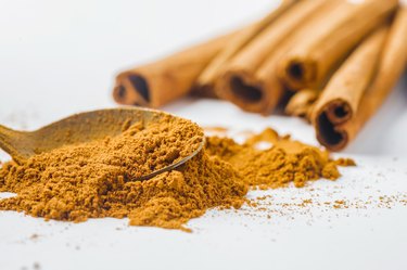 Ground cinnamon and cinnamon sticks