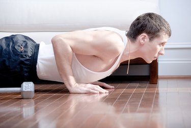 Man Doing Push-ups in Living Room