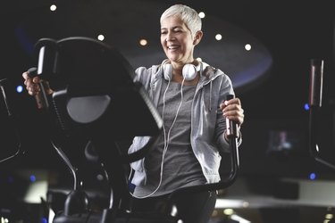 Senior woman exercising at the gym