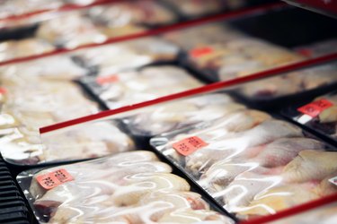 Refrigerated chicken legs in store marked for recall