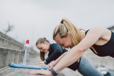 Girlfriends doing push-ups together