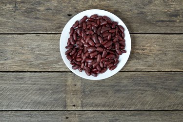 Directly Above Shot Of Kidney Beans In Plate On Wooden Table