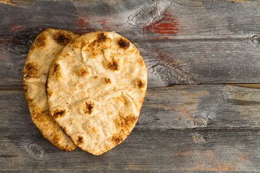 Simply delicious baked naan flatbreads on Picnic Table