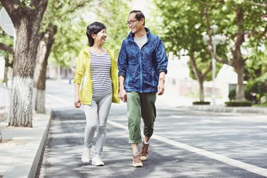 Couple walking down the street for exercise