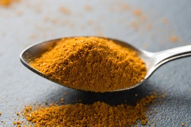 spoon of curry spice macro