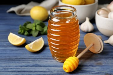 Composition with natural cough remedies on wooden table