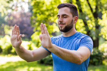 Man practicing Tai Chi outside