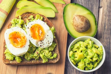 Toast with avocado and egg, two muscle-building fats