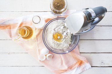 Mixing flour and eggs with a table mixer