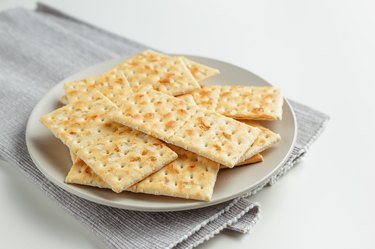 Snack plate of crackers closeup on the table