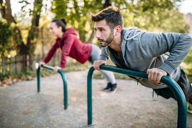 Couple working out together in the park