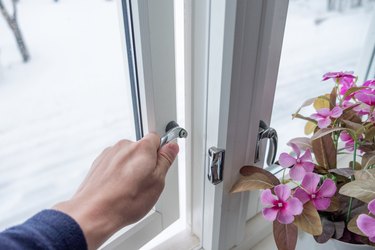 Hand opening window with flower decoration