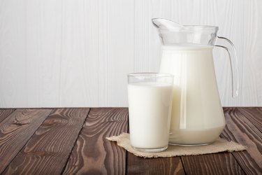 milk in glass and jug